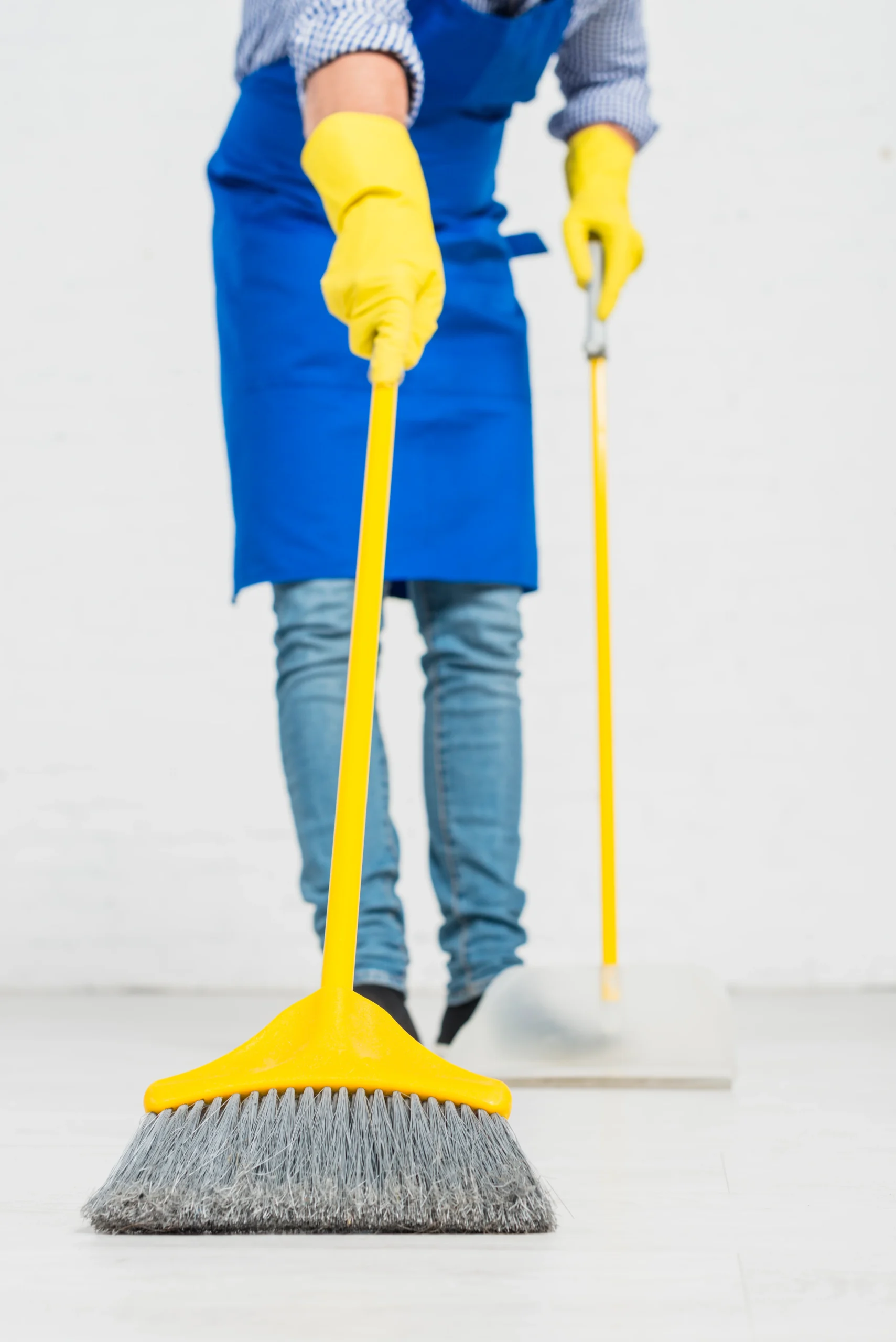 close-up-man-cleaning-his-house